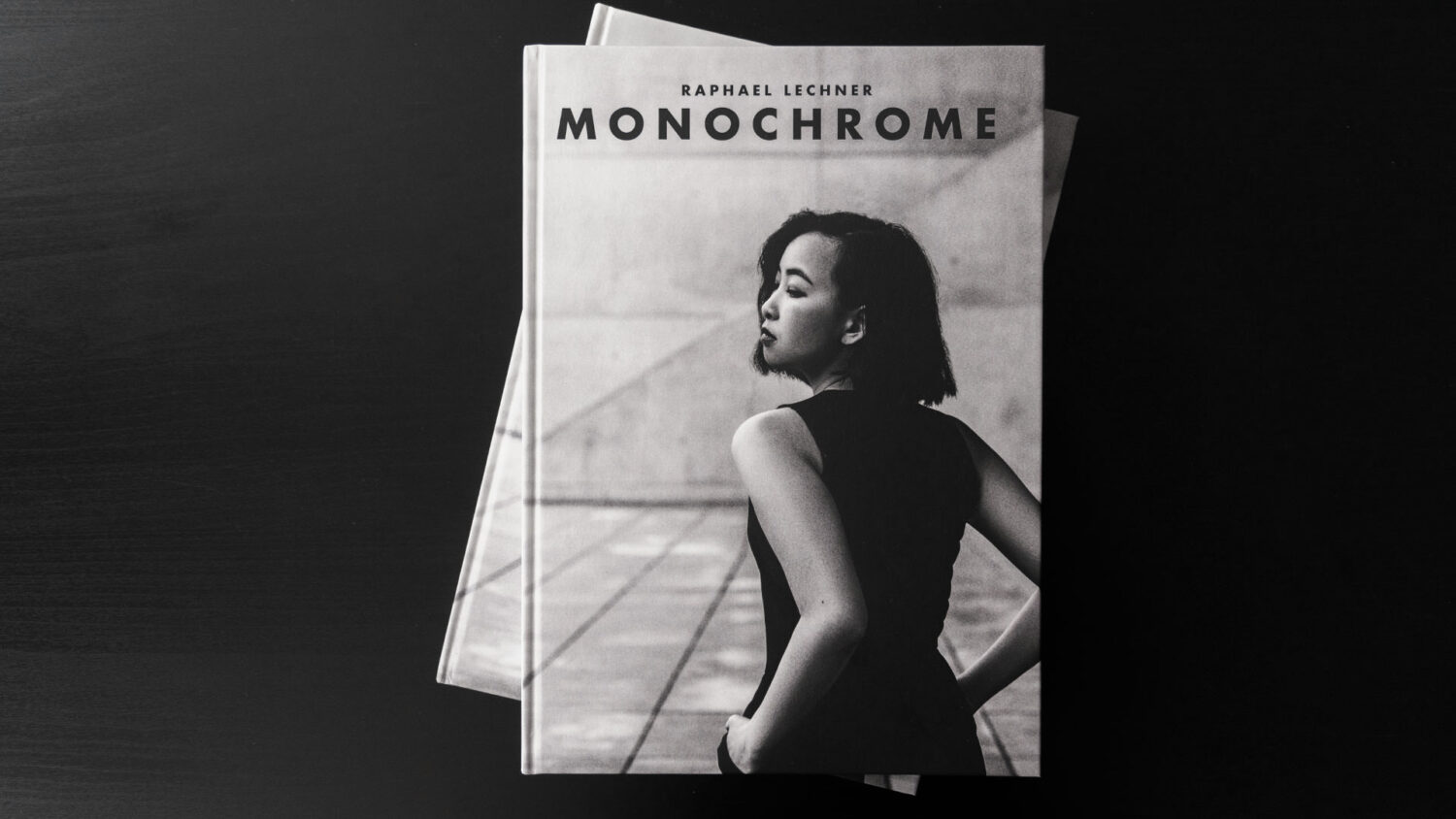 Monochrome books stacked on each other