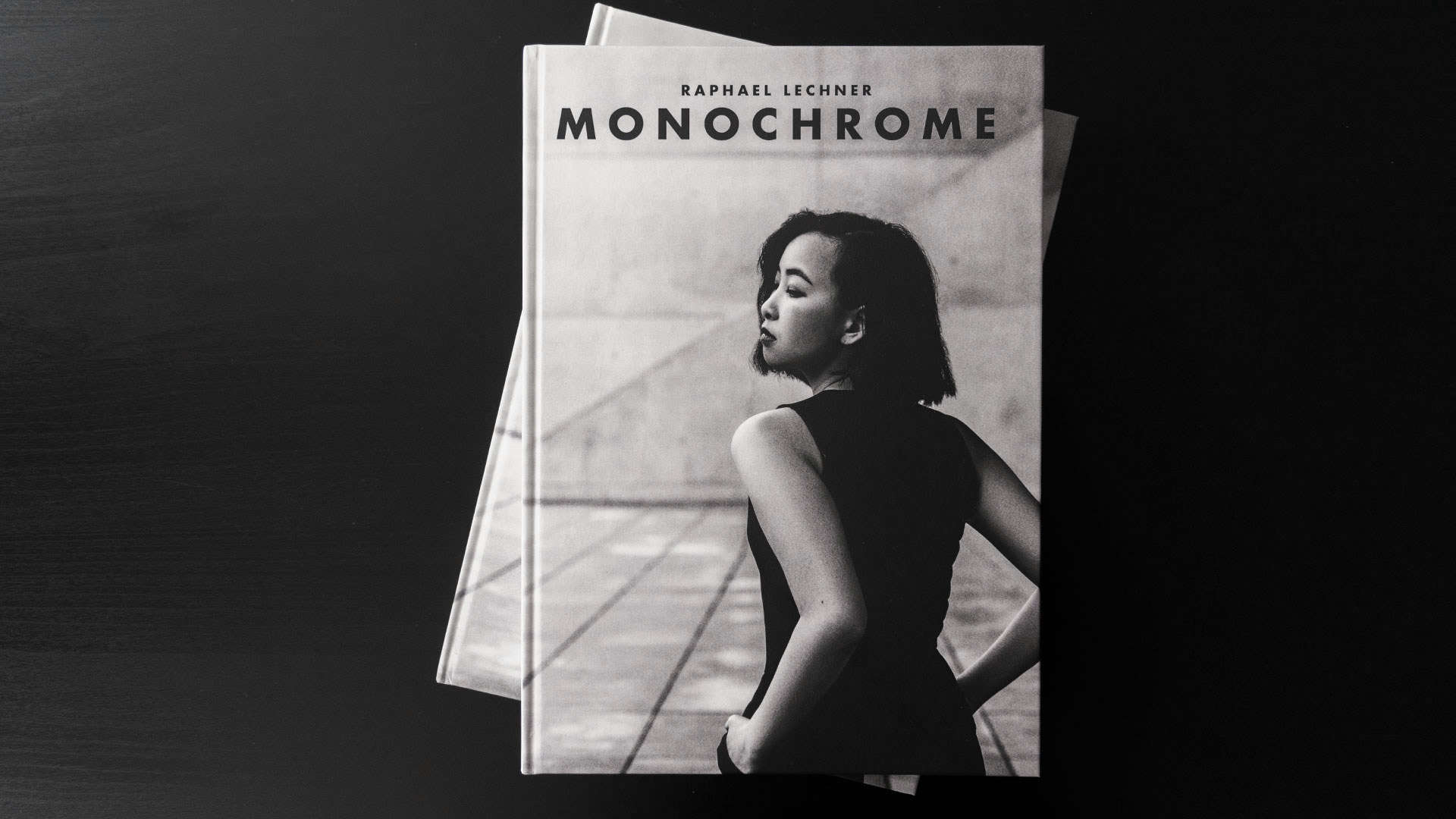 Monochrome books stacked on each other